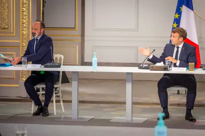 Emmanuel Macron et Edouard Philippe lors de leur rencontre avec les partenaires sociaux à l’Elysée, le 24 juin.